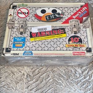 tickle me Elmo. Never removed from box